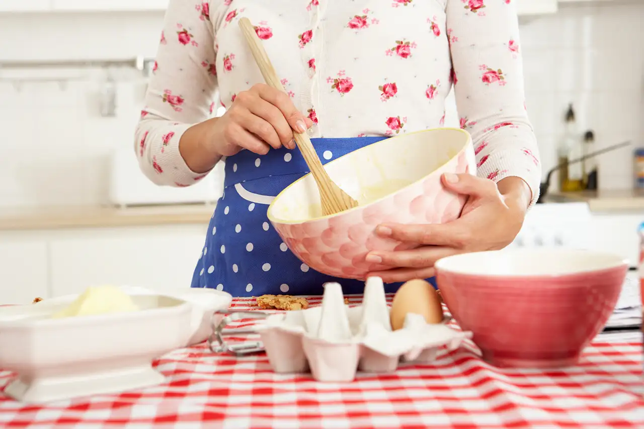 Woman stirring mix in bowl